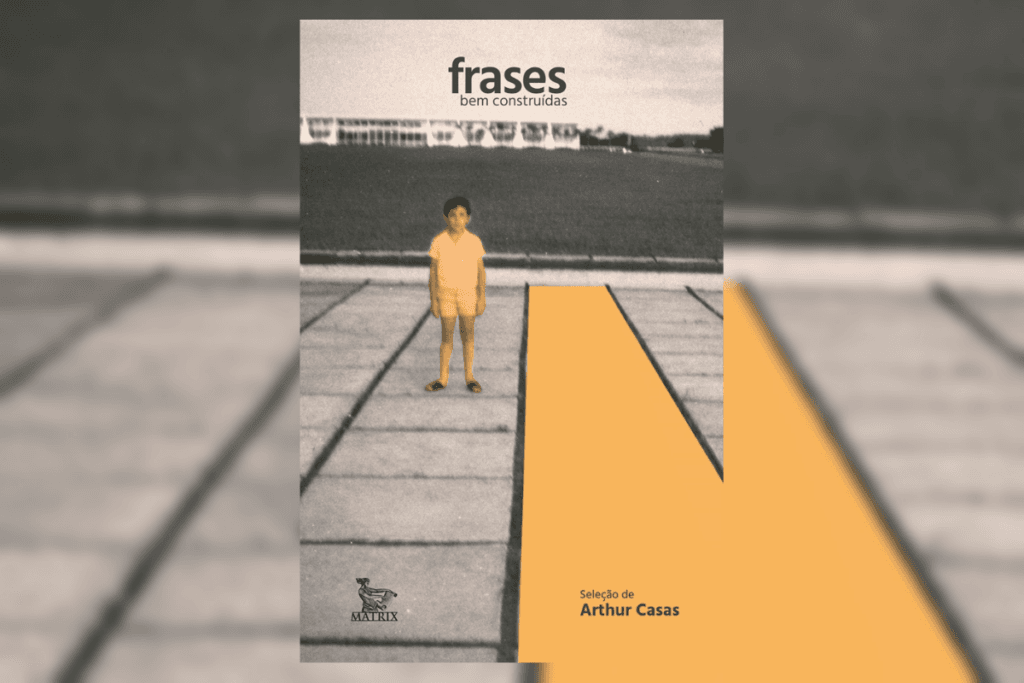 Capa de livro com título e nome do autor e a imagem de um menino com uma camiseta amarela e uma bermuda bege, ao lado de uma faixa amarela na rua