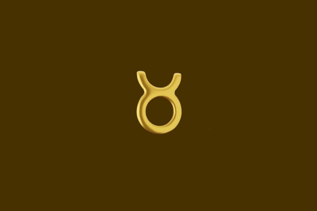 Ilustração do símbolo do signo de Touro dourado em um fundo marrom