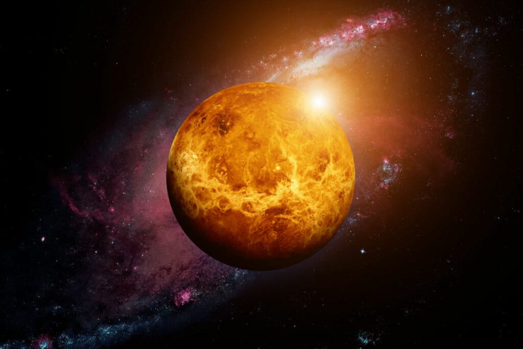 Ilustração do planeta Vênus com uma luz amarela do lado 