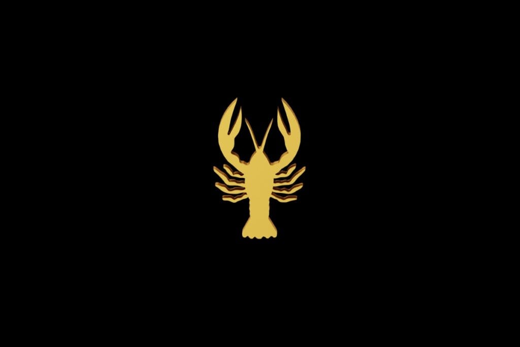 Ilustração do signo de Câncer em dourado sobre um fundo preto