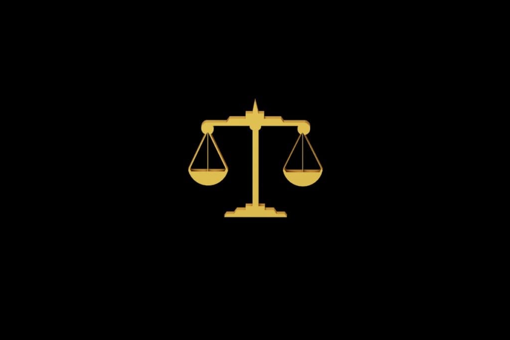 Ilustração do signo de Libra em dourado sobre um fundo preto
