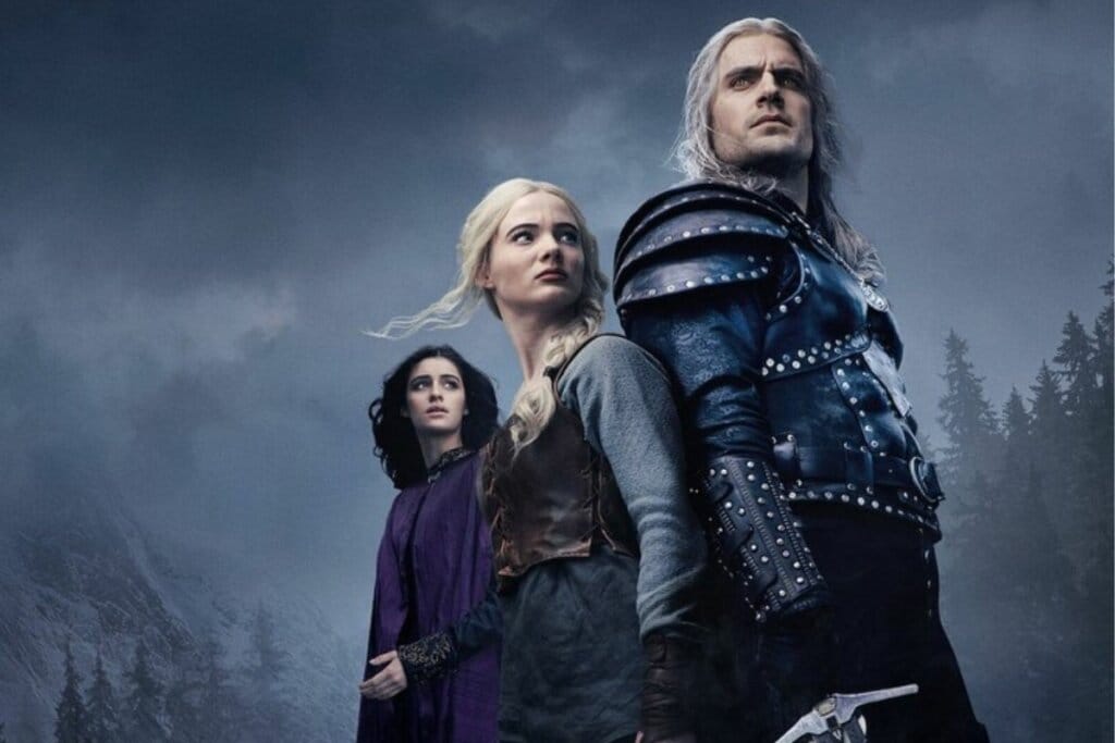 Capa da série 'The Witcher' com três personagens um na frente do outro e usando roupa preta