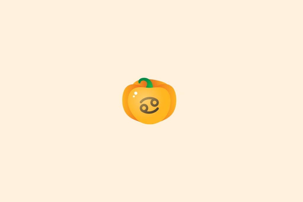 Ilustração do signo de câncer dentro de uma abóbora sobre um fundo laranja-claro