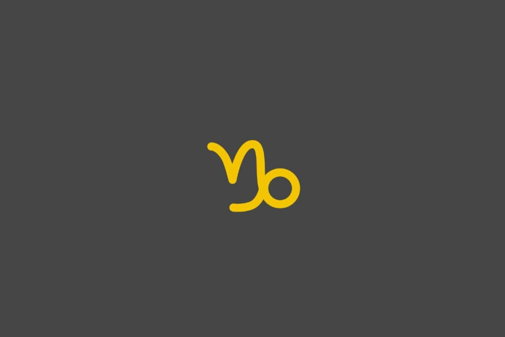 Ilustração do signo de capricórnio em amarelo em um fundo cinza
