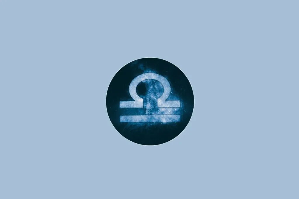 Ilustração do signo de Libra, em fundo azulado, com uma linha horizontal cortada por um arco
