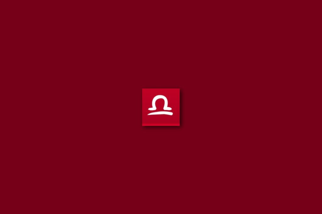 Ilustração branca do signo de libra em um fundo vermelho