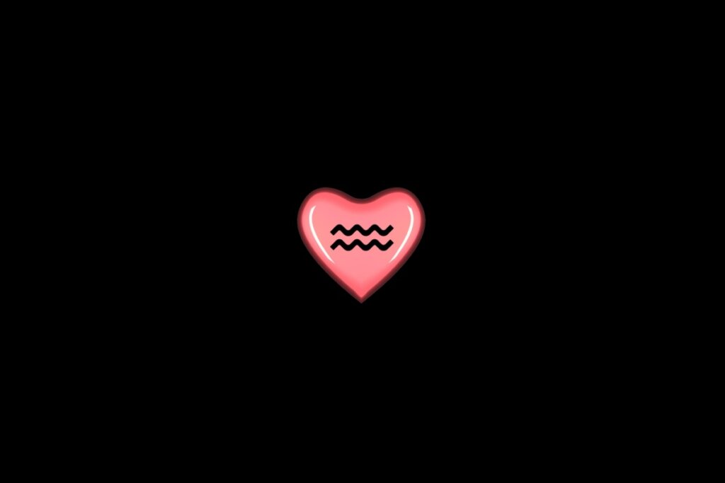 Ilustração de um coração rosa, com o símbolo do signo de aquário dentro, centralizado em um fundo preto