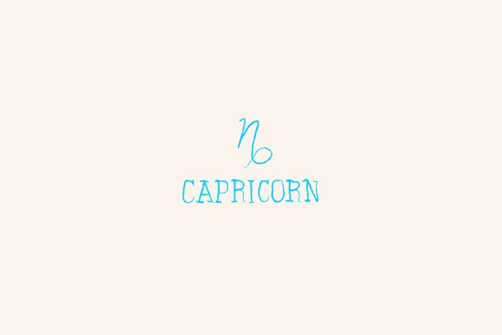 Símbolo do signo de capricórnio, na cor azul, centralizado em um fundo bege-claro e com o nome abaixo