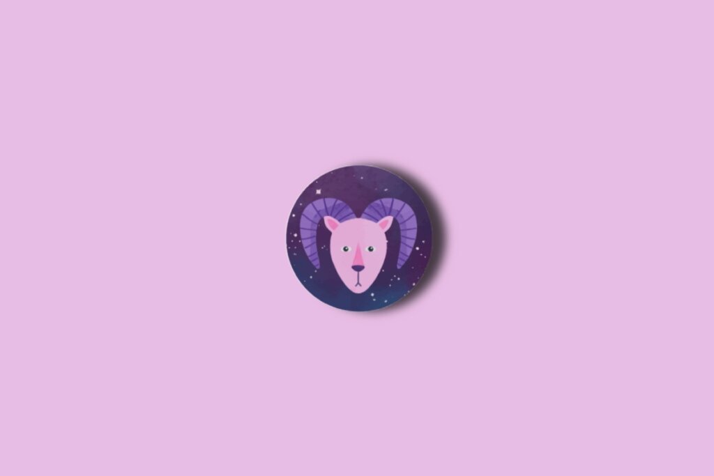 Ilustração do signo de capricórnio em um círculo azul com estrelas e sobre um fundo rosa