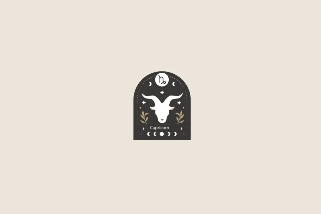 Símbolo estilizado do signo de capricórnio sobre um formato de arco preto. O fundo geral é bege-claro