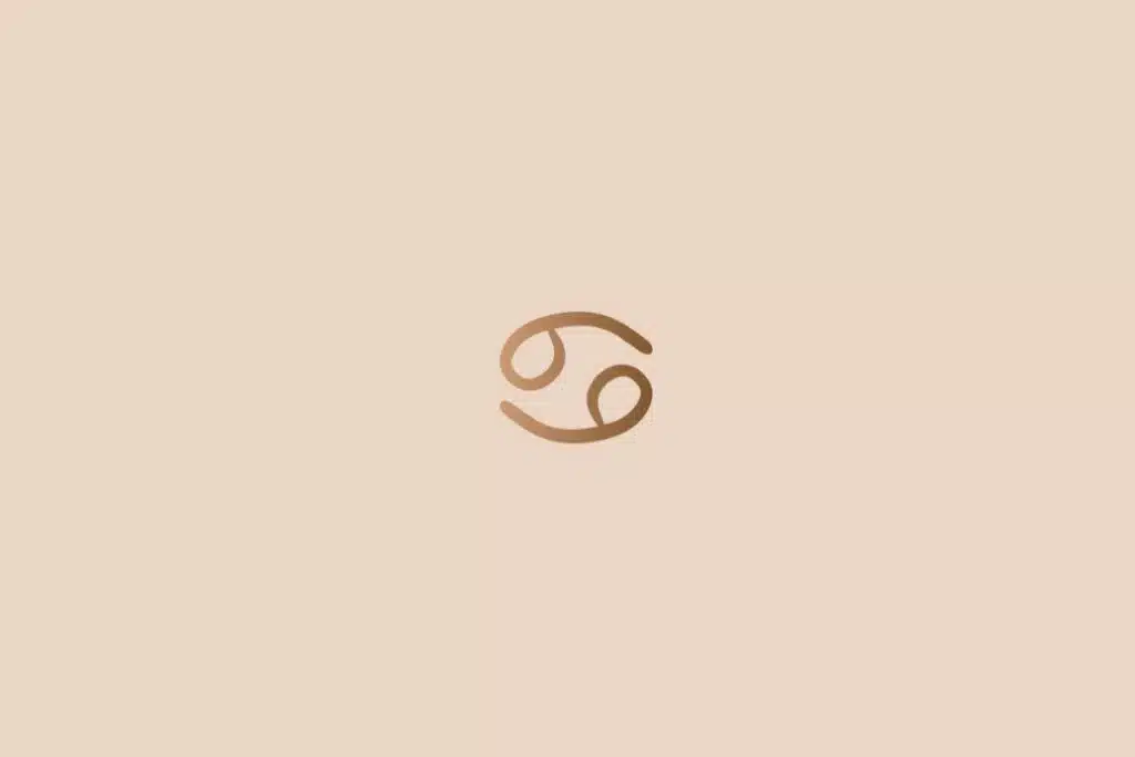 Ilustração do signo de câncer na cor marrom em um fundo bege-claro
