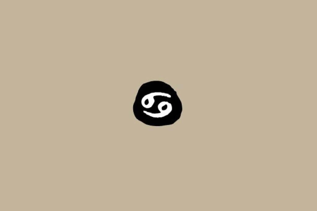 Símbolo do signo de Câncer em branco dentro de um círculo preto sobre um fundo bege