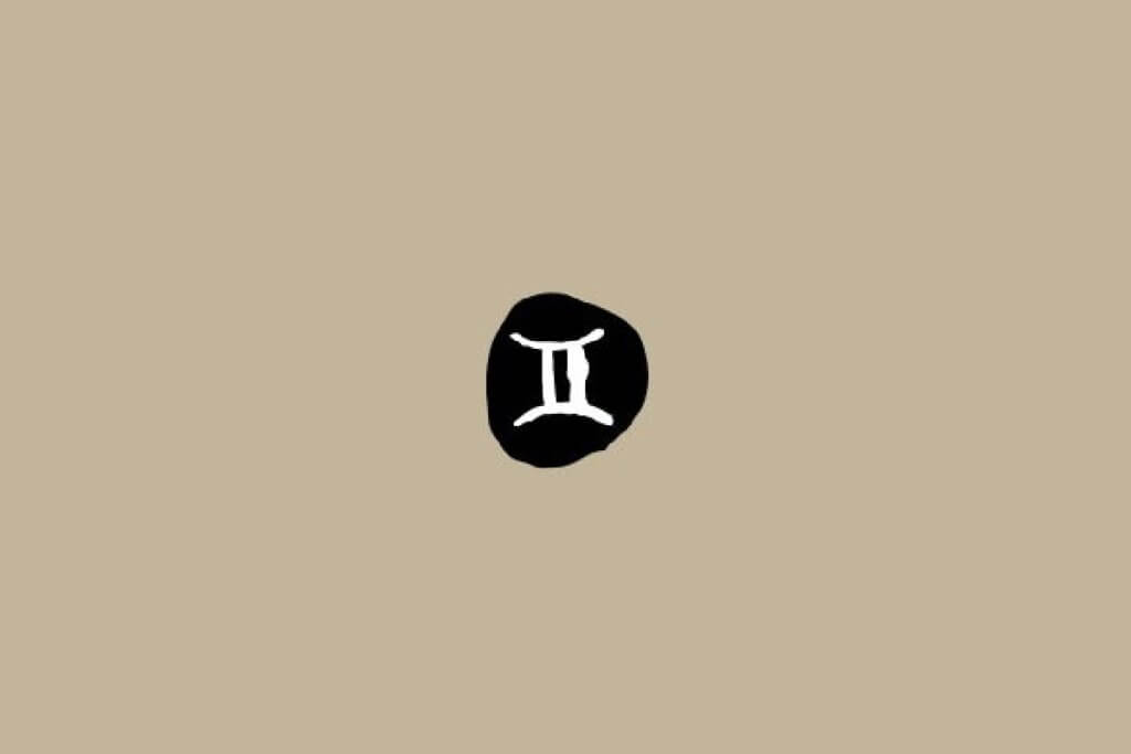 Símbolo do signo de Gêmeos em branco dentro de um círculo preto sobre um fundo bege