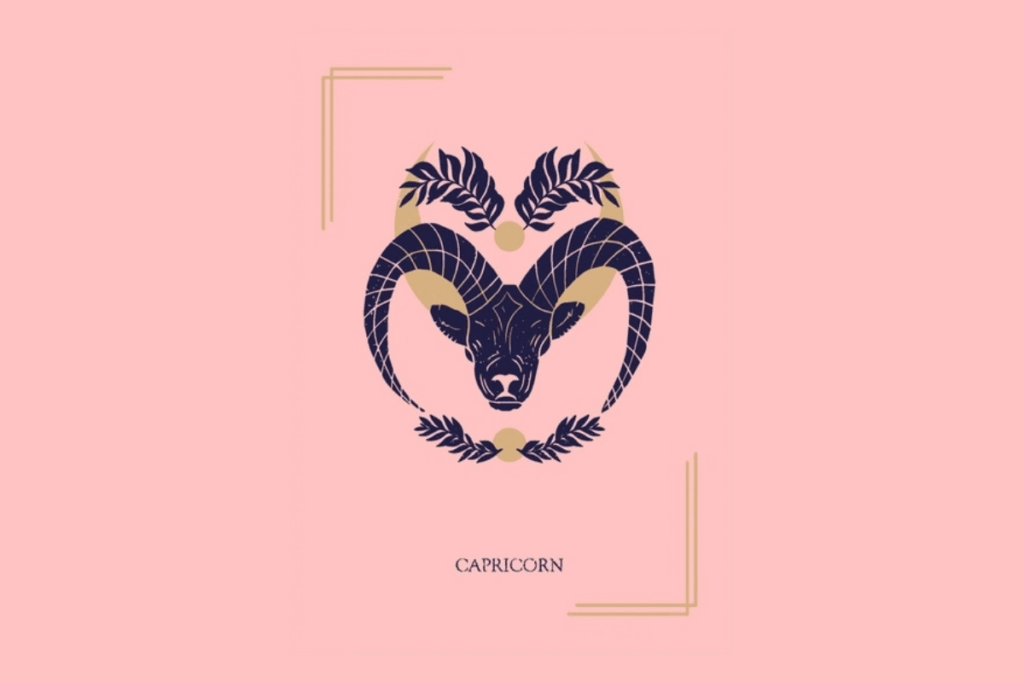 Ilustração mística sobre fundo rosa com a palavra "CAPRICORN" na parte inferior. Ao centro, a cabeça de uma cabra com chifres curvados decorados, emoldurada por uma lua crescente e ramos de folhas.