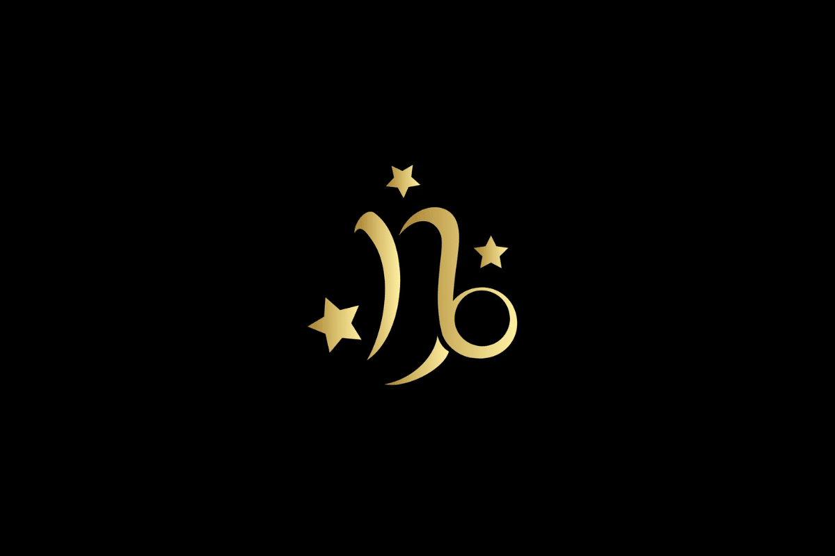 Ilustração minimalista do signo de capricórnio em dourado, centralizado sobre um fundo preto. O símbolo é acompanhado por três estrelas douradas de diferentes tamanhos