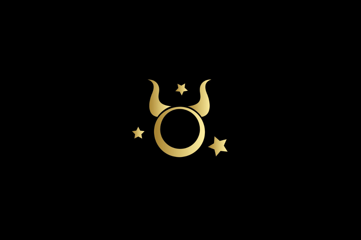 Ilustração minimalista do signo de touro em dourado, centralizado sobre um fundo preto. O símbolo é acompanhado por três estrelas douradas de diferentes tamanhos
