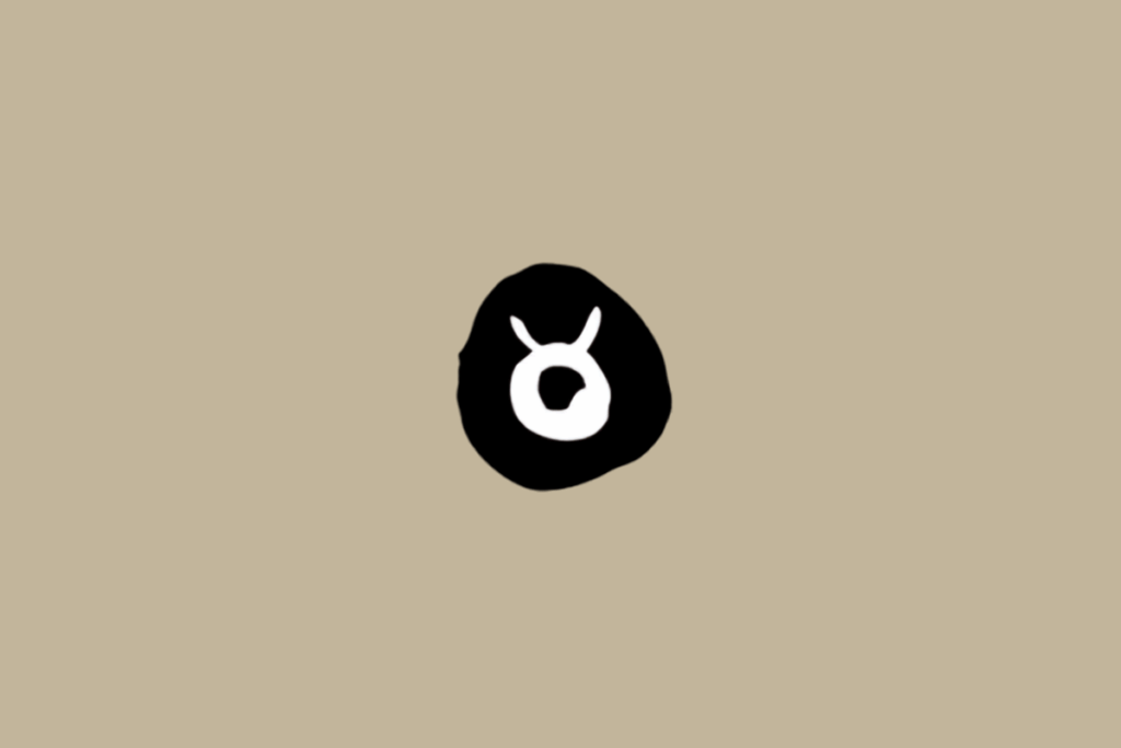 Símbolo do signo de Touro em branco dentro de círculo preto em fundo bege