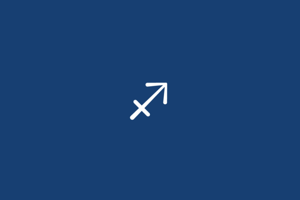 Símbolo do signo de Sagitário, em branco, representado por uma seta diagonal apontada para o alto à direita, atravessada por um traço diagonal no sentido oposto. O fundo é azul-marinho uniforme.