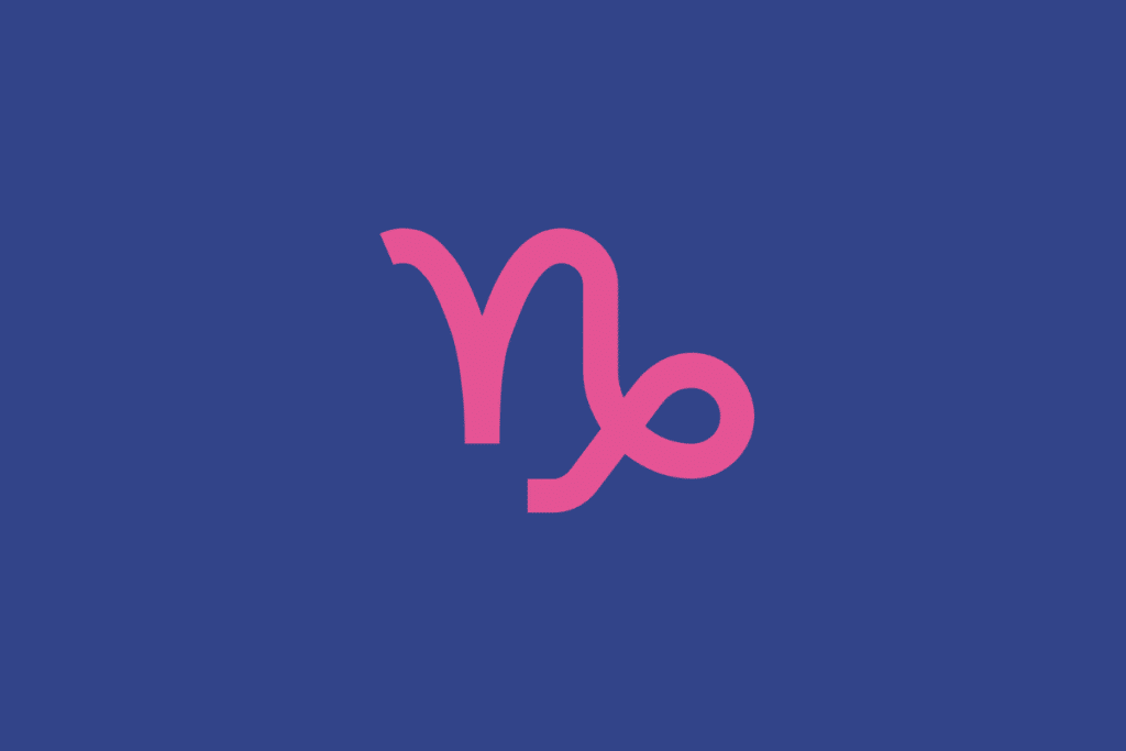O símbolo astrológico do signo de Capricórnio em rosa sobre um fundo azul-escuro