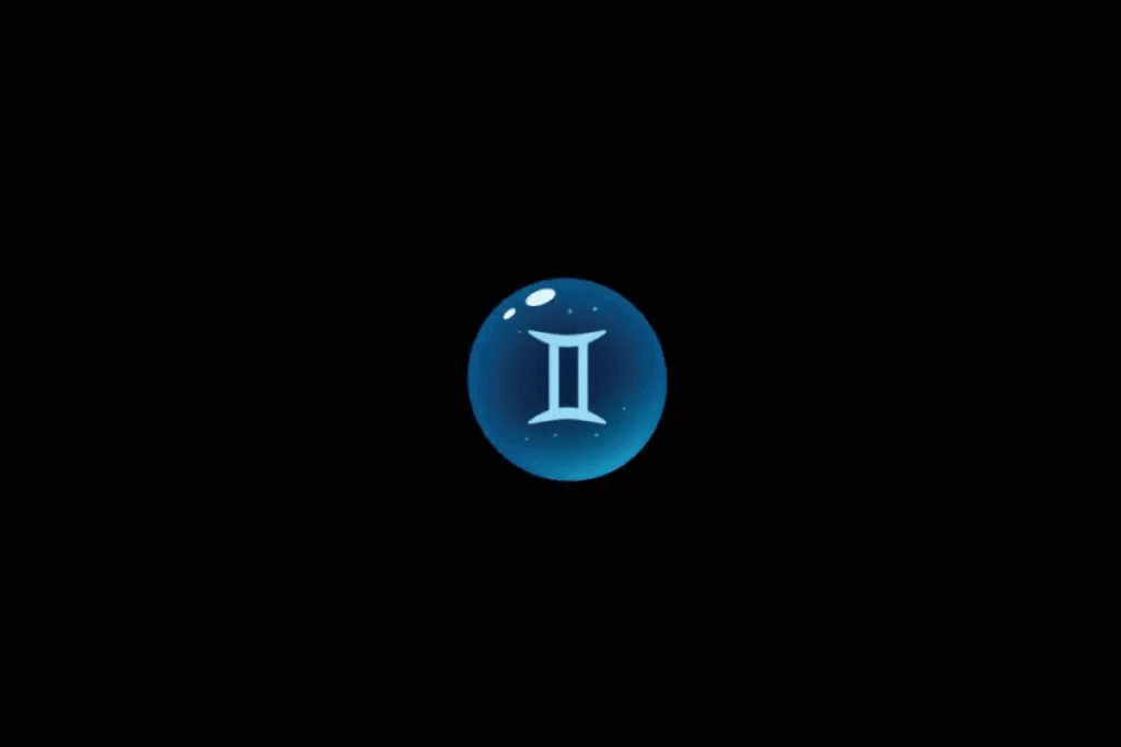 Imagem com fundo preto, apresentando uma esfera azul brilhante no centro, com o símbolo astrológico do signo de Gêmeos em azul-claro, formado por duas linhas verticais paralelas, conectadas por linhas curvas nas extremidades. A esfera possui efeito tridimensional, pequenos pontos luminosos e reflexos brancos na parte superior.
