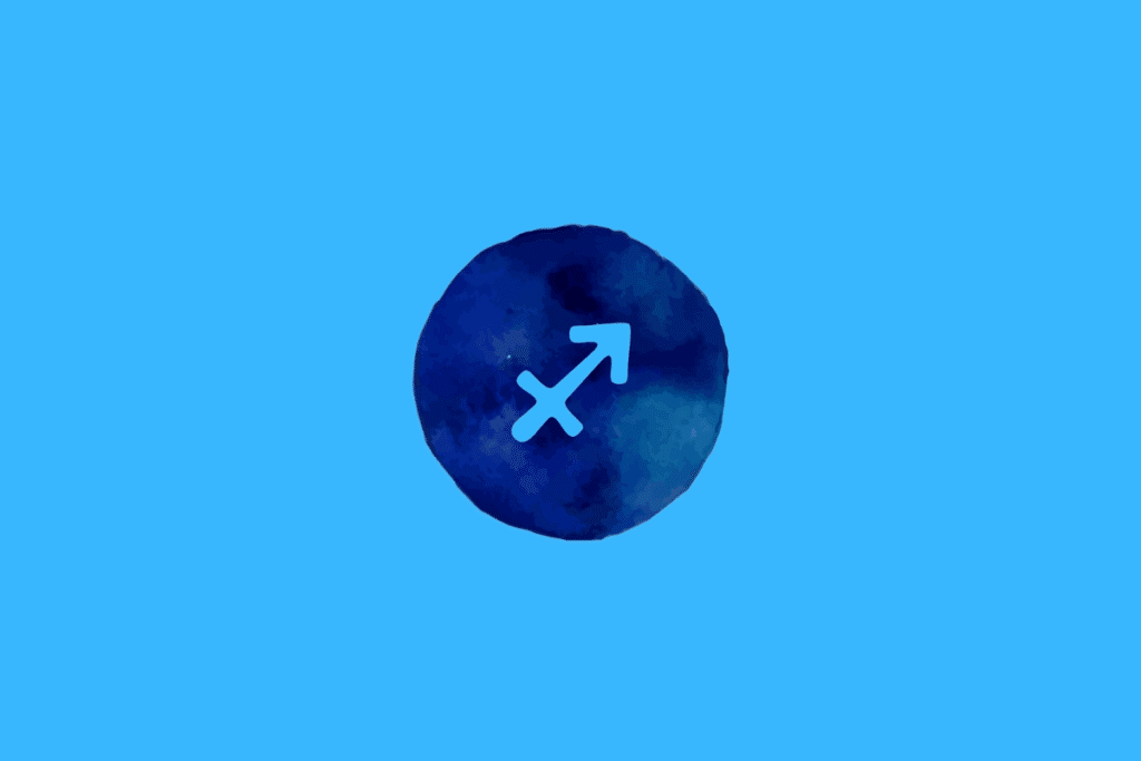 Símbolo do signo de Sagitário em azul sobre um círculo azul com textura aquarelada, em um fundo azul-claro.